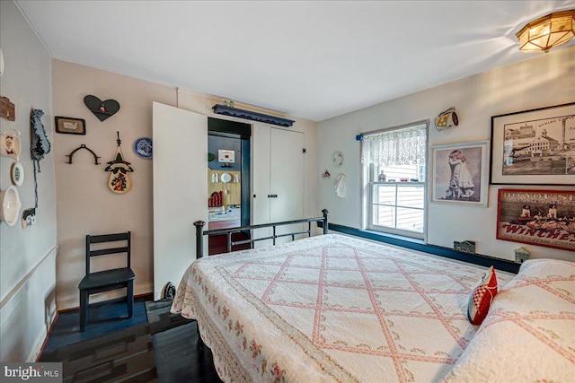 bedroom featuring dark hardwood / wood-style floors