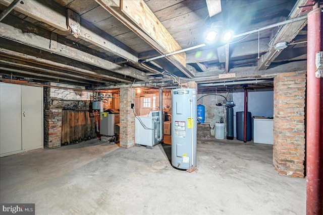 basement with washer / clothes dryer and electric water heater