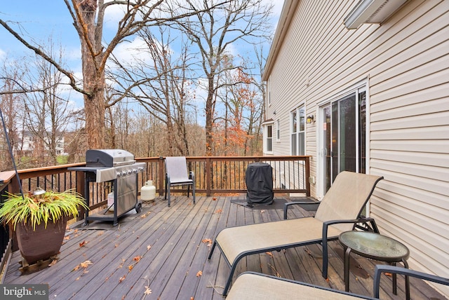 wooden deck with area for grilling