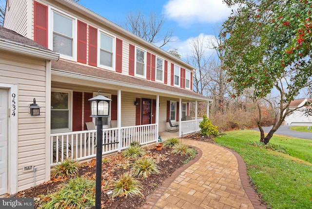 view of front of house with covered porch