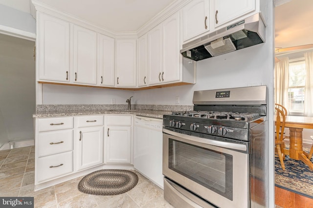 kitchen featuring gas range, white cabinetry, white dishwasher, and light stone counters