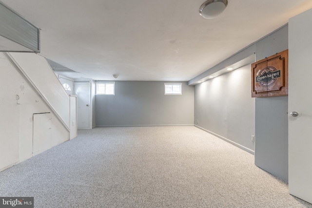 basement with light carpet