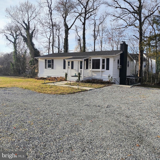 ranch-style home featuring cooling unit