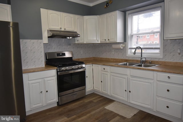 kitchen featuring white cabinetry and stainless steel appliances