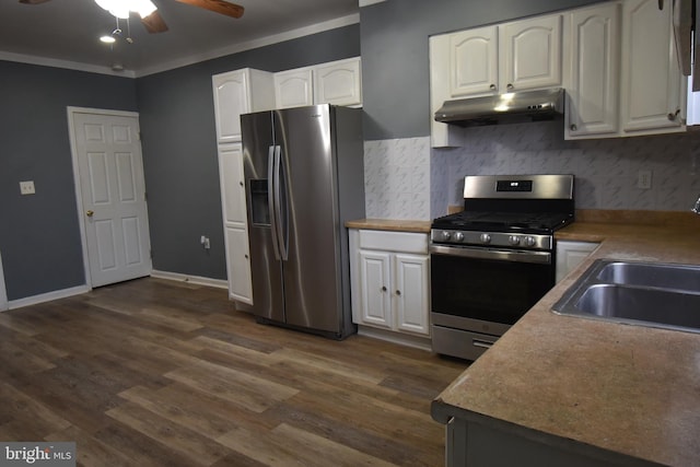 kitchen with white cabinetry, crown molding, dark hardwood / wood-style floors, and appliances with stainless steel finishes