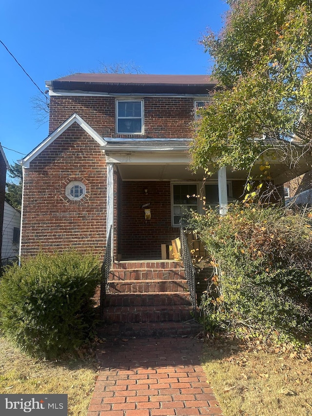 view of front property featuring a porch