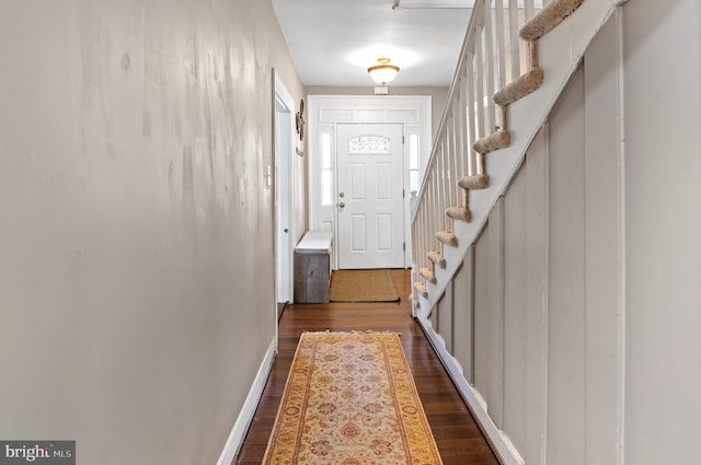 doorway to outside with dark hardwood / wood-style flooring