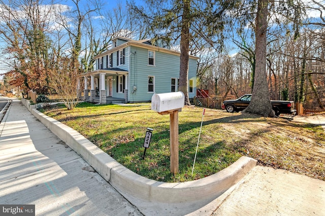 view of home's exterior featuring a porch