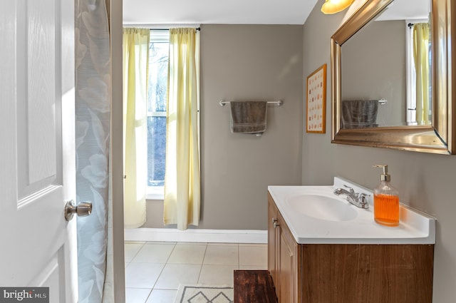 bathroom with tile patterned flooring and vanity