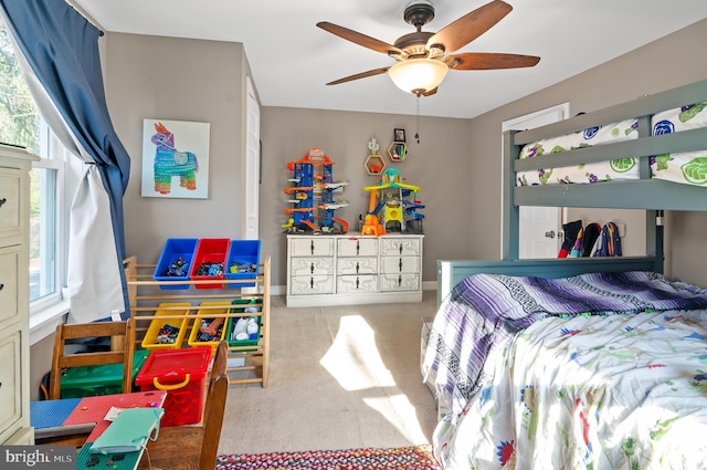 carpeted bedroom featuring ceiling fan