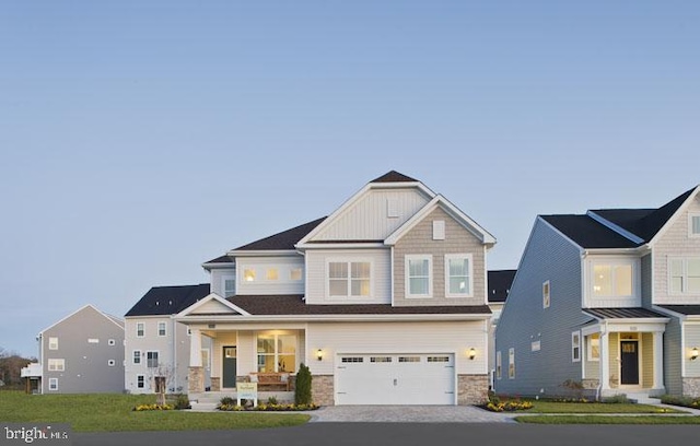 craftsman house featuring a garage