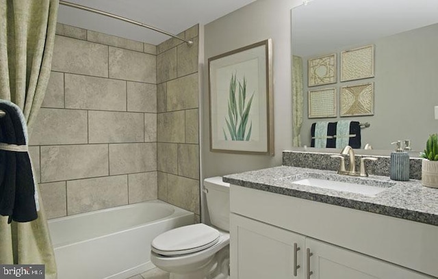 full bathroom featuring toilet, vanity, and shower / tub combo with curtain