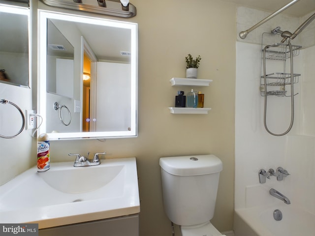 full bathroom featuring  shower combination, toilet, and vanity