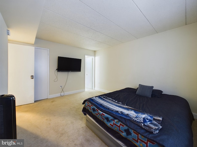 bedroom featuring carpet