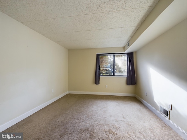 empty room featuring carpet