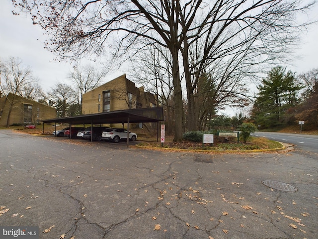 exterior space featuring a carport