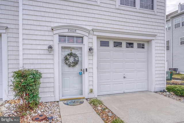 entrance to property featuring a garage