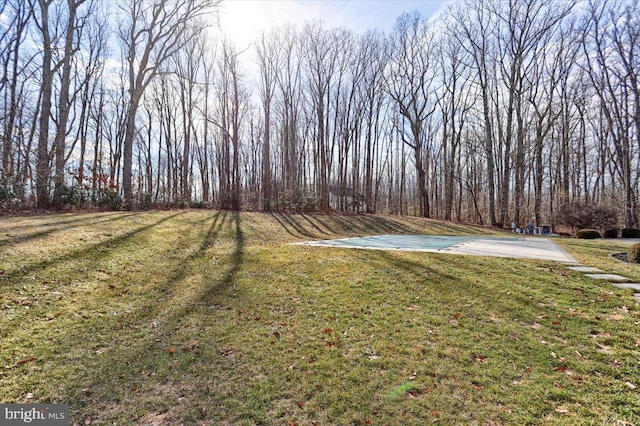 view of yard with community basketball court