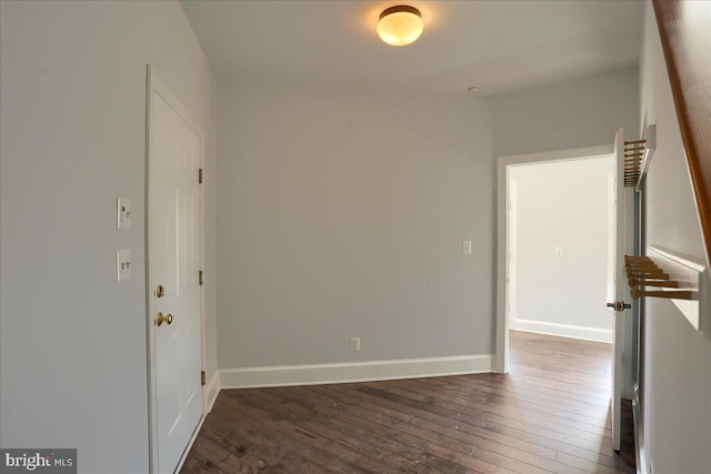 interior space featuring hardwood / wood-style floors and baseboards