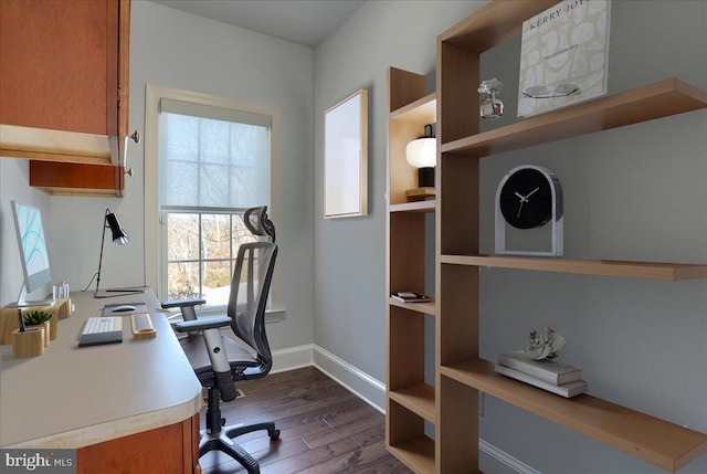 office space featuring dark wood-style floors and baseboards