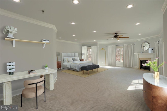 bedroom featuring a fireplace, ornamental molding, carpet flooring, and recessed lighting