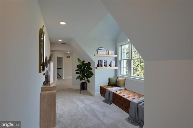 hallway with baseboards, vaulted ceiling, carpet flooring, and recessed lighting