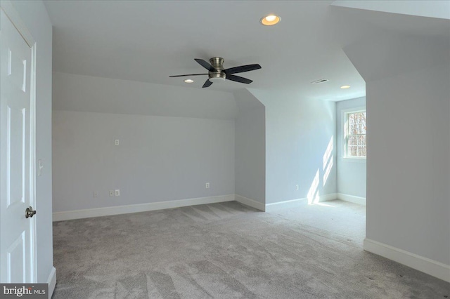 additional living space featuring visible vents, baseboards, a ceiling fan, carpet floors, and recessed lighting