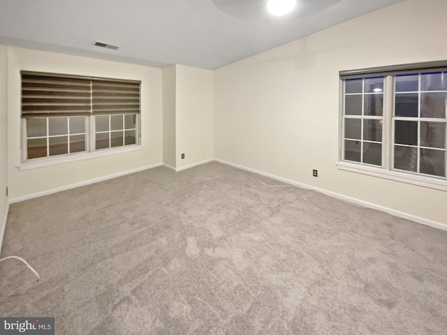 view of carpeted spare room