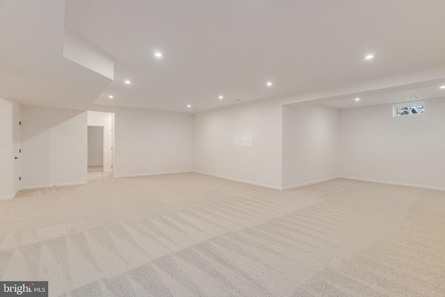 basement with light carpet