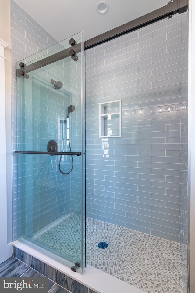 bathroom featuring walk in shower