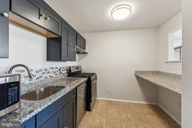 kitchen featuring sink, stainless steel appliances, light stone counters, backsplash, and extractor fan