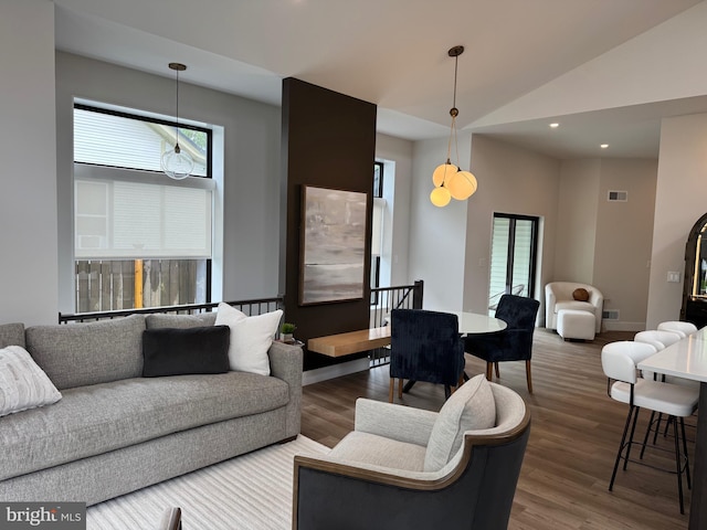 256 S Cedar St, Lititz, PA 17543 - living area featuring wood finished floors, vaulted ceiling, recessed lighting, and baseboards