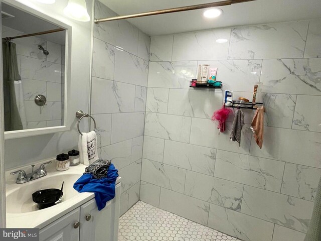 bathroom featuring vanity and walk in shower