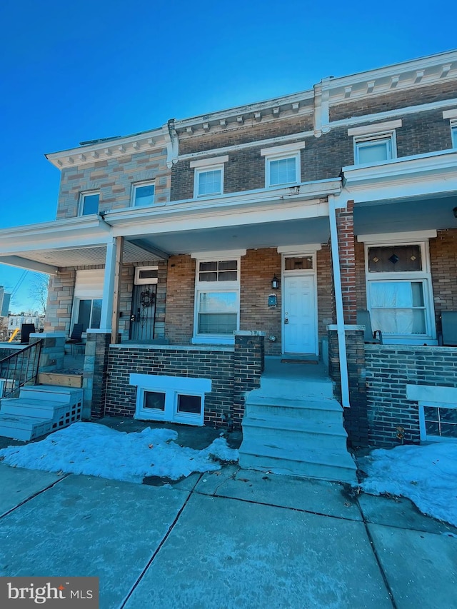 view of property featuring a porch