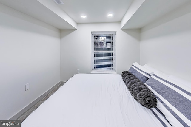 bedroom featuring dark hardwood / wood-style floors