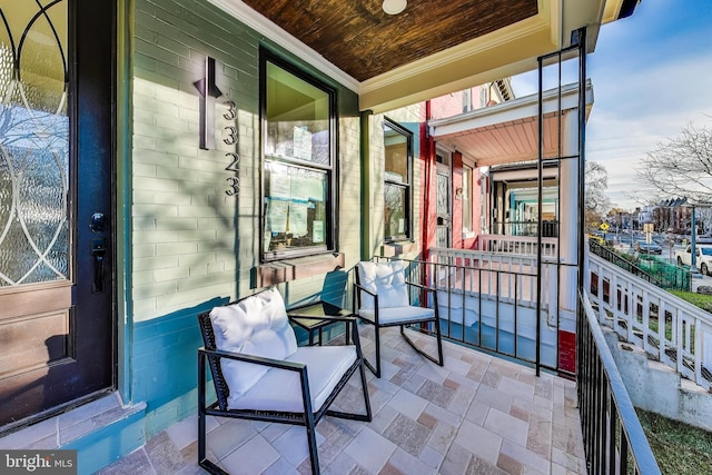 balcony featuring covered porch