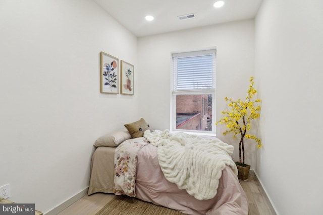 bedroom featuring light hardwood / wood-style flooring