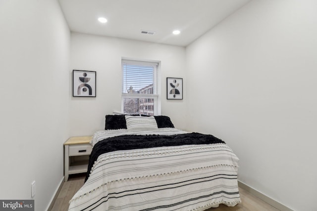 bedroom featuring light hardwood / wood-style floors