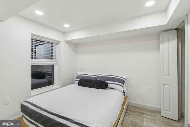 bedroom with light hardwood / wood-style flooring