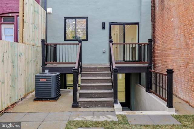 entrance to property featuring central AC