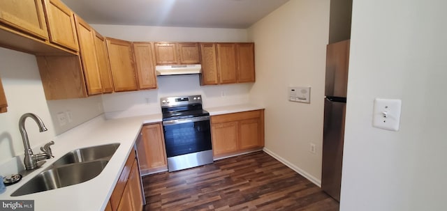 kitchen featuring sink, stainless steel appliances, and dark hardwood / wood-style floors