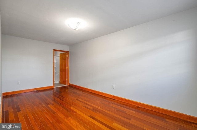 unfurnished room featuring hardwood / wood-style floors