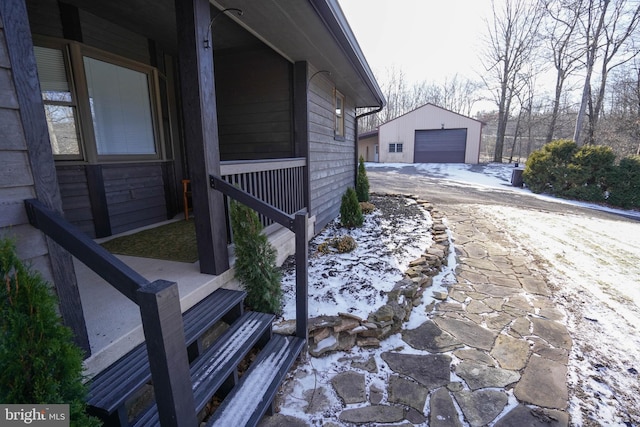 view of side of home with an outbuilding and a garage