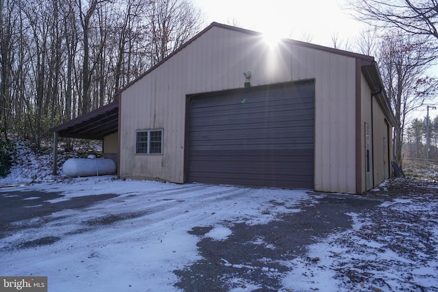 view of snow covered garage