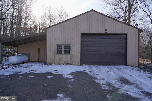 view of snow covered garage