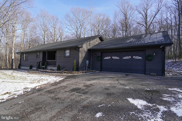 single story home featuring a garage