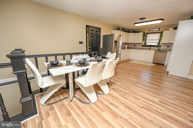 dining area featuring light hardwood / wood-style flooring