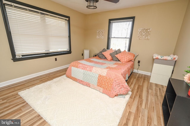 bedroom with hardwood / wood-style flooring