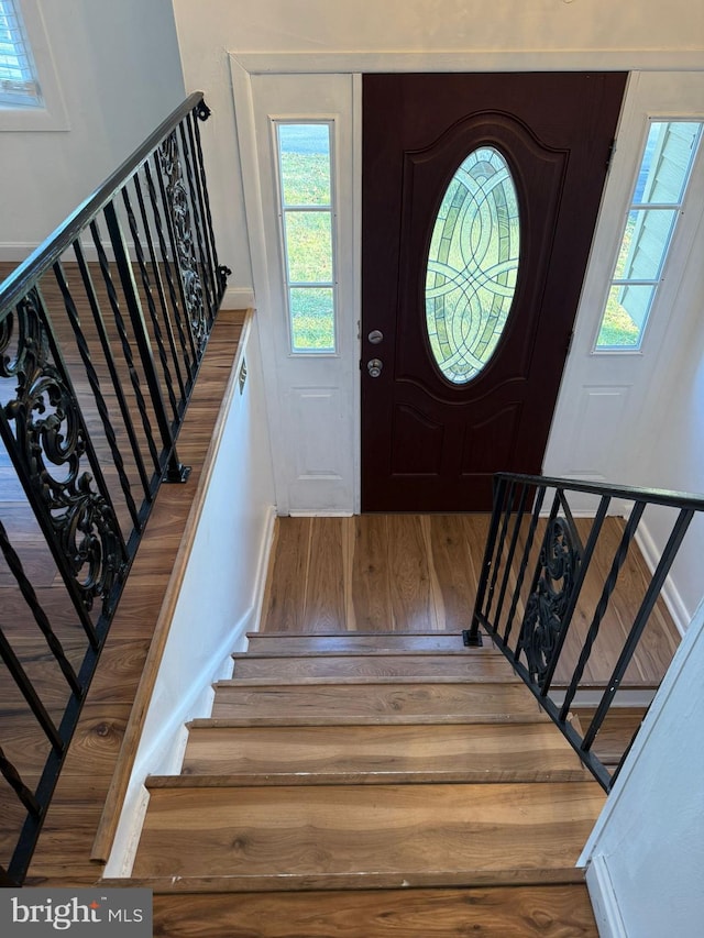 entrance foyer with hardwood / wood-style floors