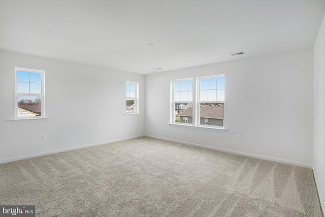 unfurnished room with carpet